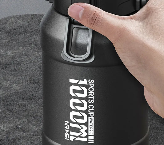 Bottiglia d'acqua in acciaio inossidabile portatile con manico di trasporto - Fenomenologia Shop